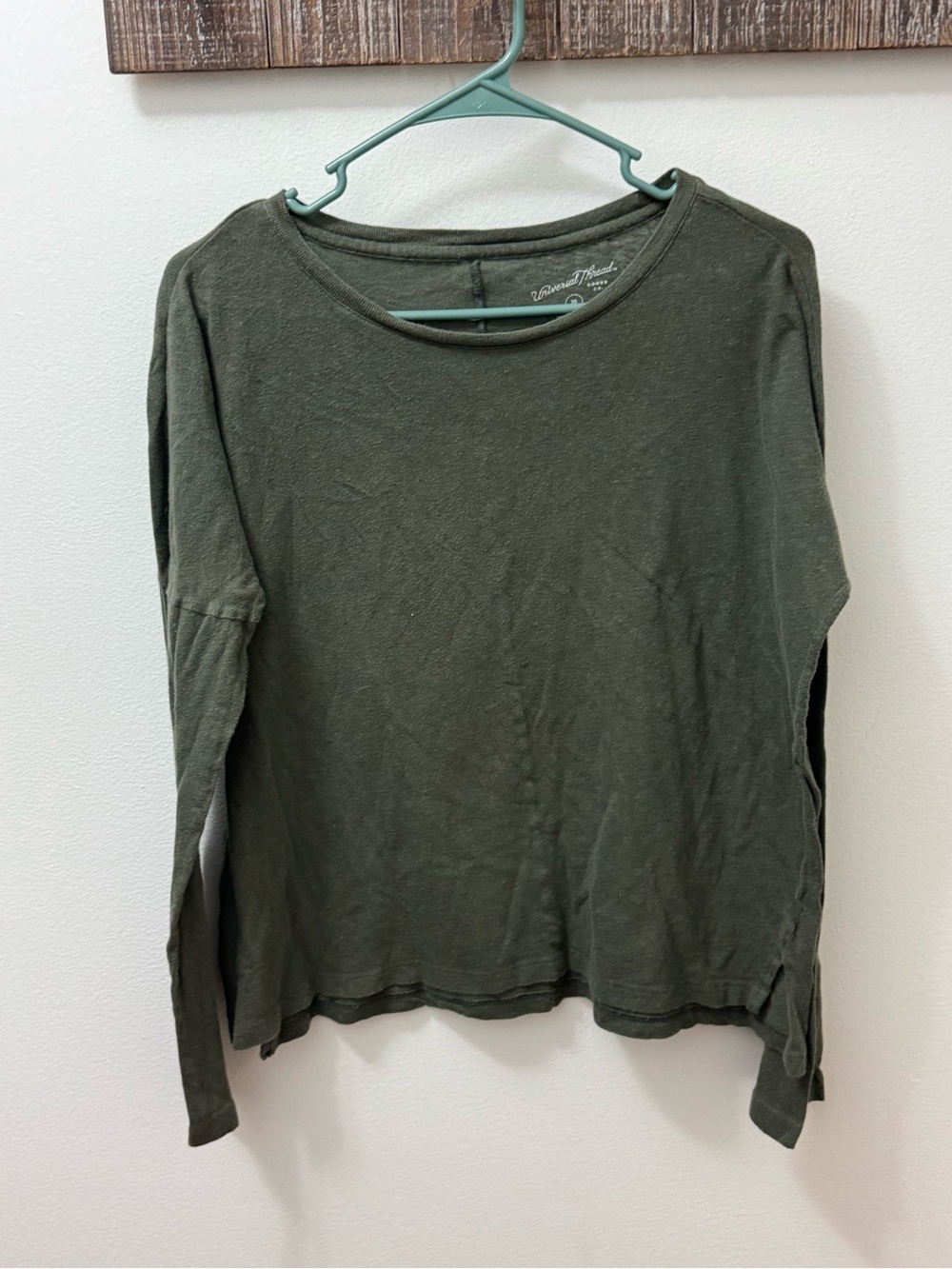Universal Thread dark green long-sleeve crewneck blouse.